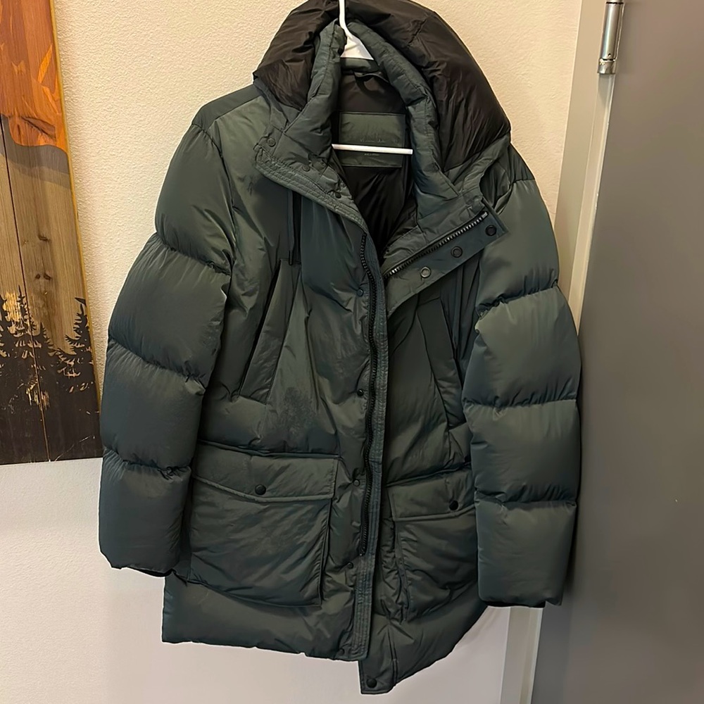 The jacket has been worn once. I moved and no longer need it. This is brand new.